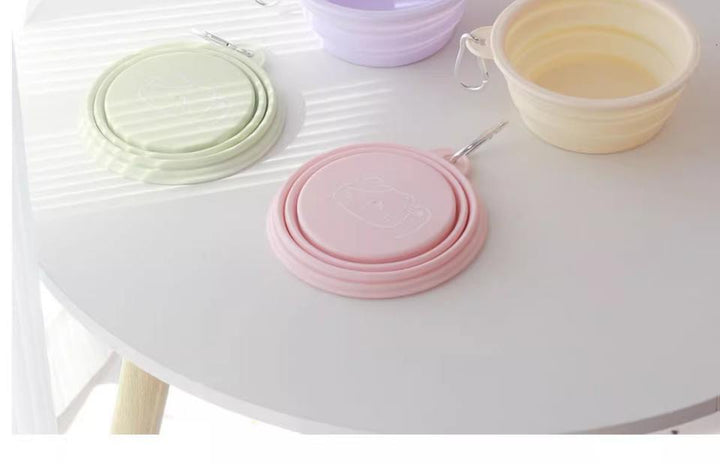 Folding pet bowls shown open and closed