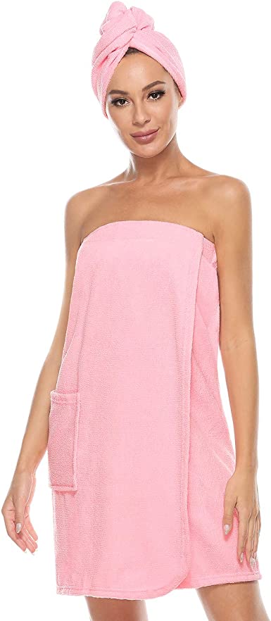 Pink spa body wrap towel with adjustable closure worn after a shower